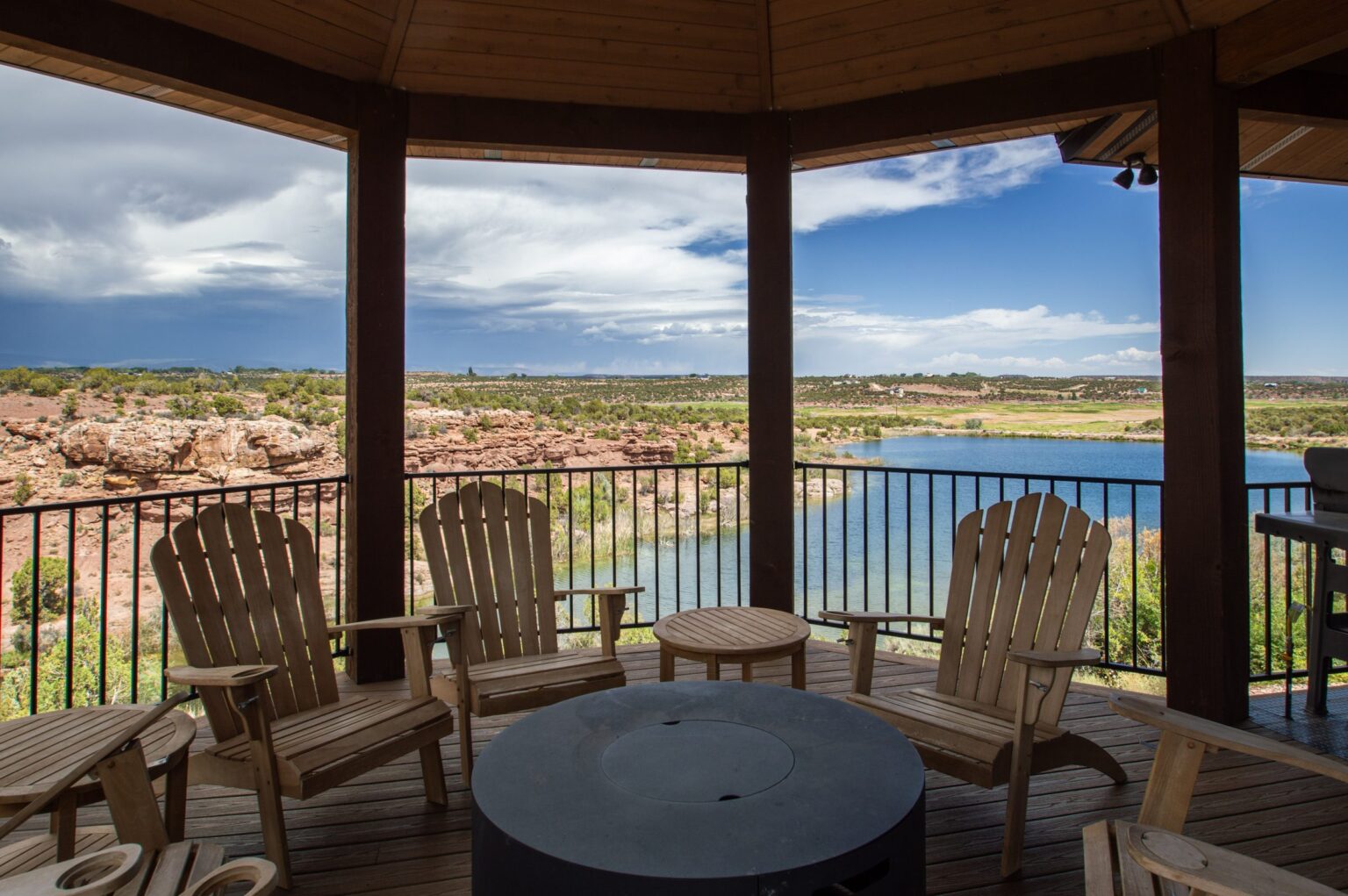 Covered deck seating with a view over the lakes