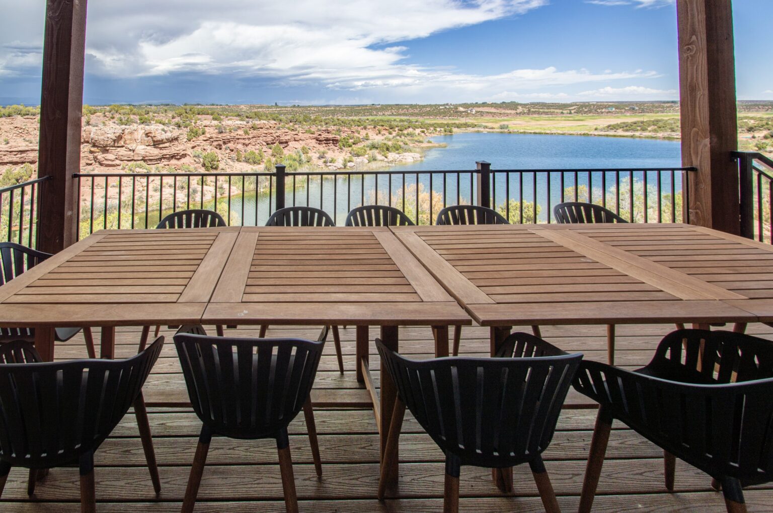 Covered deck dining table overlooking Cliff Lake